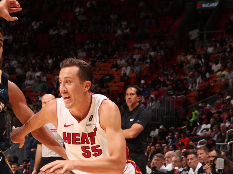 MIAMI, FL - OCTOBER 13: Duncan Robinson #55 of the Miami Heat dribbles the ball during the game against the New Orleans Pelicans during a NBA pre season game on October 13, 2024 at Kaseya Center in Miami, Florida. NOTE TO USER: User expressly acknowledges and agrees that, by downloading and or using this Photograph, user is consenting to the terms and conditions of the Getty Images License Agreement. Mandatory Copyright Notice: Copyright 2024 NBAE (Photo by Issac Baldizon/NBAE via Getty Images)