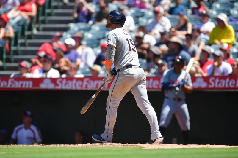 Jun 27, 2024; Anaheim, California, USA; Detroit Tigers catcher Carson Kelly (15) hits a three run home run against the Los Angeles Angels during the fifth inning at Angel Stadium. Mandatory Credit: Gary A. Vasquez-USA TODAY Sports