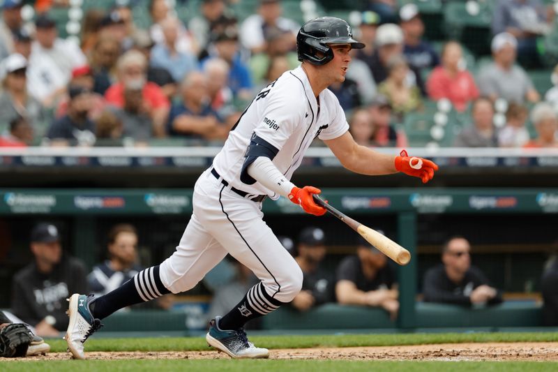 Jun 11, 2023; Detroit, Michigan, USA;  Detroit Tigers right fielder Kerry Carpenter (30) hits an single in the fourth inning against the Arizona Diamondbacks  at Comerica Park. Mandatory Credit: Rick Osentoski-USA TODAY Sports