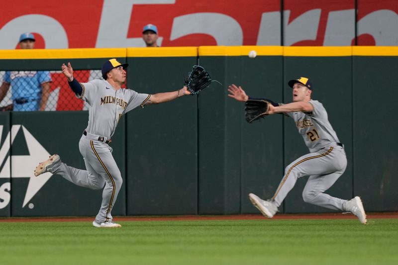 Aug 20, 2023; Arlington, Texas, USA; Milwaukee Brewers right fielder Mark Canha (21) catches the fly-out in front of right fielder Tyrone Taylor (15) hit by Texas Rangers shortstop Corey Seager (not shown) during the fifth inning at Globe Life Field. Mandatory Credit: Jim Cowsert-USA TODAY Sports