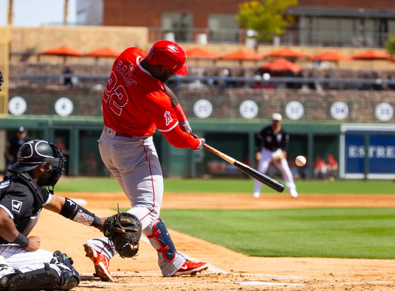 Mar 14, 2024; Phoenix, Arizona, USA; Los Angeles Angels third baseman Miguel Sano against the Chicago White Sox during a spring training baseball game at Camelback Ranch-Glendale. Mandatory Credit: Mark J. Rebilas-USA TODAY Sports