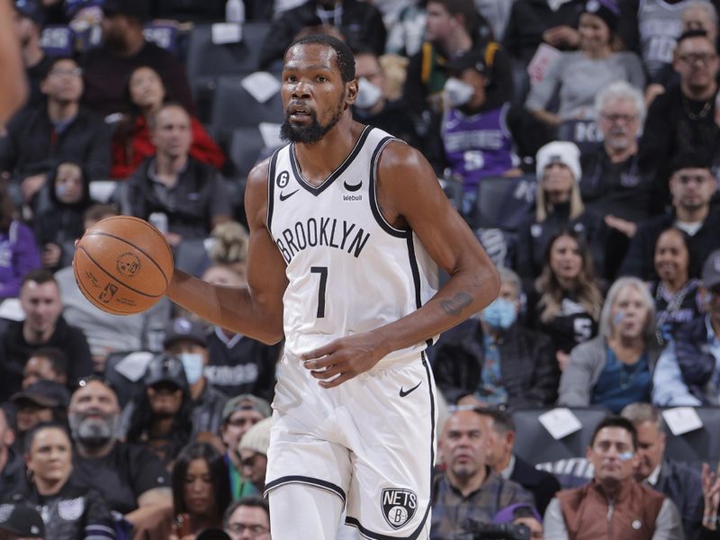 SACRAMENTO, CA - NOVEMBER 15: Kevin Durant #7 of the Brooklyn Nets dribbles the ball during the game against the Brooklyn Nets on November 15, 2022 at Golden 1 Center in Sacramento, California. NOTE TO USER: User expressly acknowledges and agrees that, by downloading and or using this Photograph, user is consenting to the terms and conditions of the Getty Images License Agreement. Mandatory Copyright Notice: Copyright 2022 NBAE (Photo by Rocky Widner/NBAE via Getty Images)