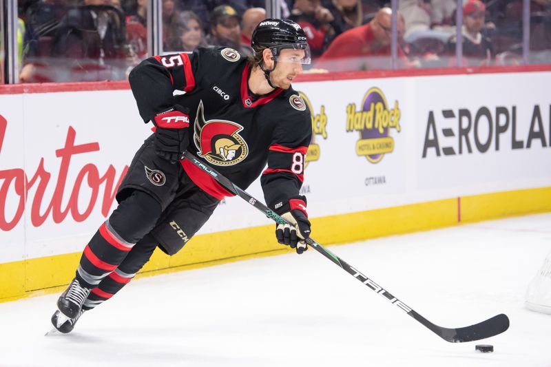 Oct 29, 2024; Ottawa, Ontario, CAN; Ottawa Senators defenseman Jake Sanderson (85) skates with the puck in the second period against the St. Louis Blues at the Canadian Tire Centre. Mandatory Credit: Marc DesRosiers-Imagn Images