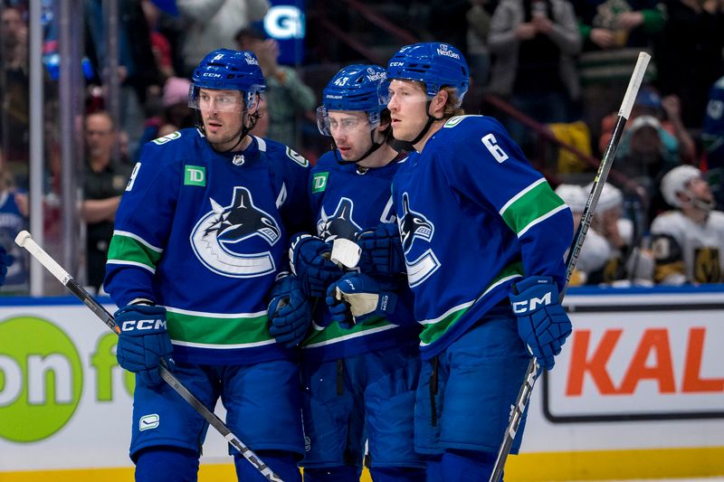 Apr 8, 2024; Vancouver, British Columbia, CAN; Vancouver Canucks forward J.T. Miller (9) and defenseman Quinn Hughes (43) and forward Brock Boeser (6) celebrate Hughes’ goal against the Vegas Golden Knights in the first period  at Rogers Arena. Mandatory Credit: Bob Frid-USA TODAY Sports