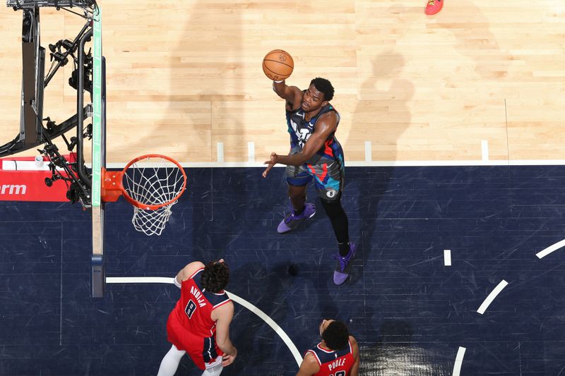 WASHINGTON, DC -? MARCH 27:  Day'Ron Sharpe #20 of the Brooklyn Nets shoots the ball during the game against the Washington Wizards on March 27, 2024 at Capital One Arena in Washington, DC. NOTE TO USER: User expressly acknowledges and agrees that, by downloading and or using this Photograph, user is consenting to the terms and conditions of the Getty Images License Agreement. Mandatory Copyright Notice: Copyright 2024 NBAE (Photo by Stephen Gosling/NBAE via Getty Images)