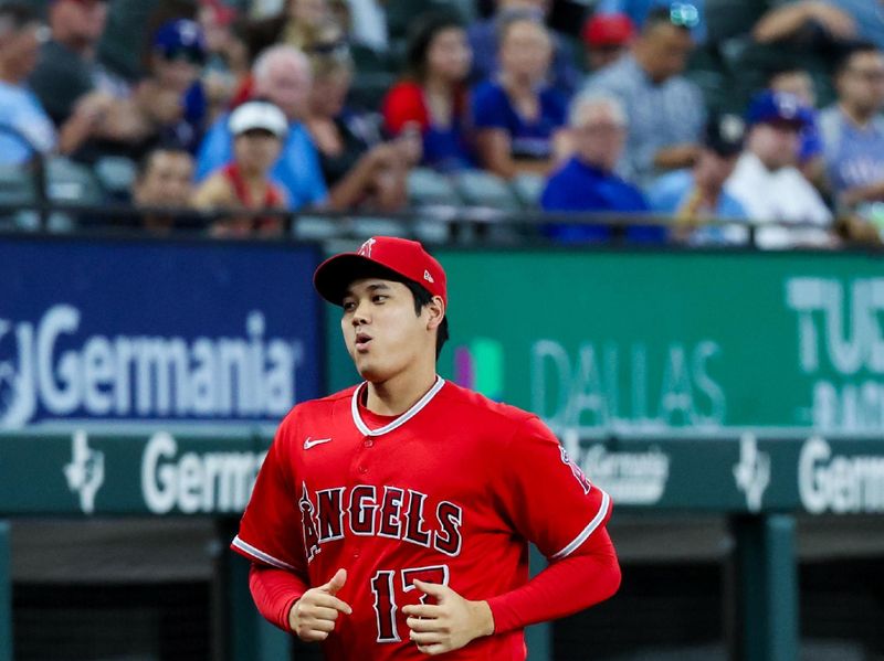 Aug 16, 2023; Arlington, Texas, USA;  Los Angeles Angels designated hitter Shohei Ohtani (17) jogs before the game against the Texas Rangers at Globe Life Field. Mandatory Credit: Kevin Jairaj-USA TODAY Sports