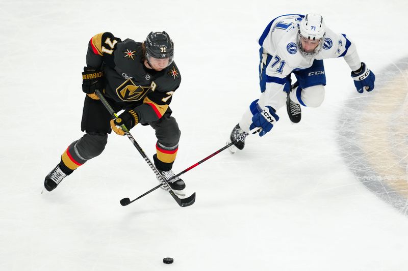 Mar 23, 2025; Las Vegas, Nevada, USA; Vegas Golden Knights center William Karlsson (71) skates against Tampa Bay Lightning center Anthony Cirelli (71) during the third period at T-Mobile Arena. Mandatory Credit: Stephen R. Sylvanie-Imagn Images