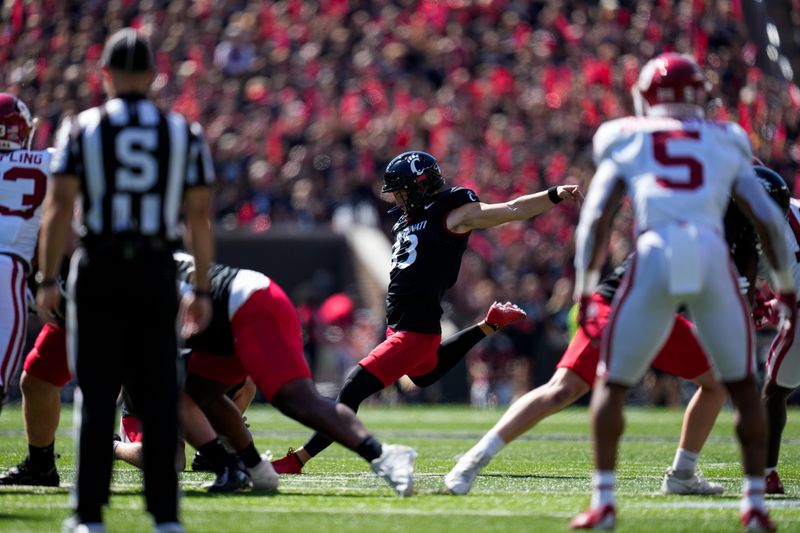 Sep 23, 2023; Cincinnati, Ohio, USA; Cincinnati Bearcats place kicker Carter Brown (33) kicks a field goal against the Oklahoma Sooners in the first quarter at Nippert Stadium. Mandatory Credit: Sam Greene-USA TODAY Sports