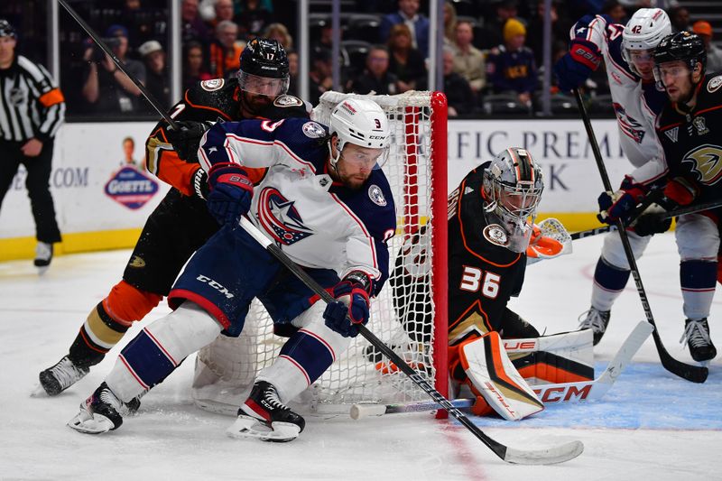 Feb 21, 2024; Anaheim, California, USA; Columbus Blue Jackets defenseman Ivan Provorov (9) moves in for a shot on goal against Anaheim Ducks goaltender John Gibson (36) and left wing Alex Killorn (17) during the second period at Honda Center. Mandatory Credit: Gary A. Vasquez-USA TODAY Sports