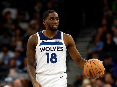 MINNEAPOLIS, MINNESOTA - NOVEMBER 01: Shake Milton #18 of the Minnesota Timberwolves dribbles the ball against the Denver Nuggets in the first quarter at Target Center on November 01, 2023 in Minneapolis, Minnesota. The Timberwolves defeated the Nuggets 110-89. NOTE TO USER: User expressly acknowledges and agrees that, by downloading and or using this photograph, User is consenting to the terms and conditions of the Getty Images License Agreement. (Photo by David Berding/Getty Images)