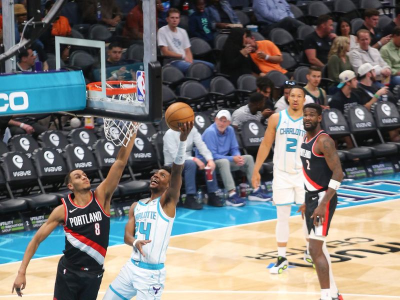 CHARLOTTE, NC - APRIL 3: Brandon Miller #24 of the Charlotte Hornets goes to the basket during the game on April 3, 2024 at Spectrum Center in Charlotte, North Carolina. NOTE TO USER: User expressly acknowledges and agrees that, by downloading and or using this photograph, User is consenting to the terms and conditions of the Getty Images License Agreement. Mandatory Copyright Notice: Copyright 2024 NBAE (Photo by Kent Smith/NBAE via Getty Images)