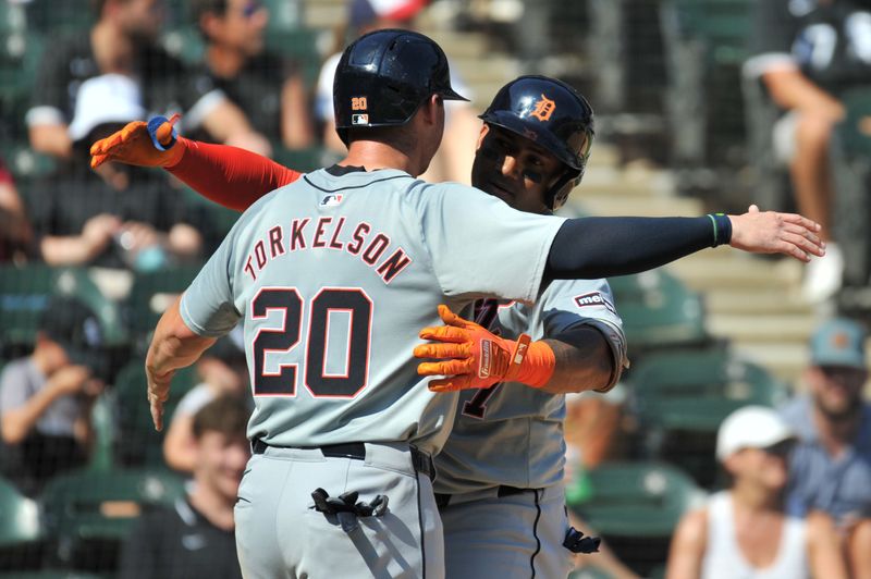 Aug 25, 2024; Chicago, Illinois, USA; Detroit Tigers second base Andy Ibanez (77) celebrates his two-run home run with first base Spencer Torkelson (20) during the seventh inning against the Chicago White Sox at Guaranteed Rate Field. Mandatory Credit: Patrick Gorski-USA TODAY Sports