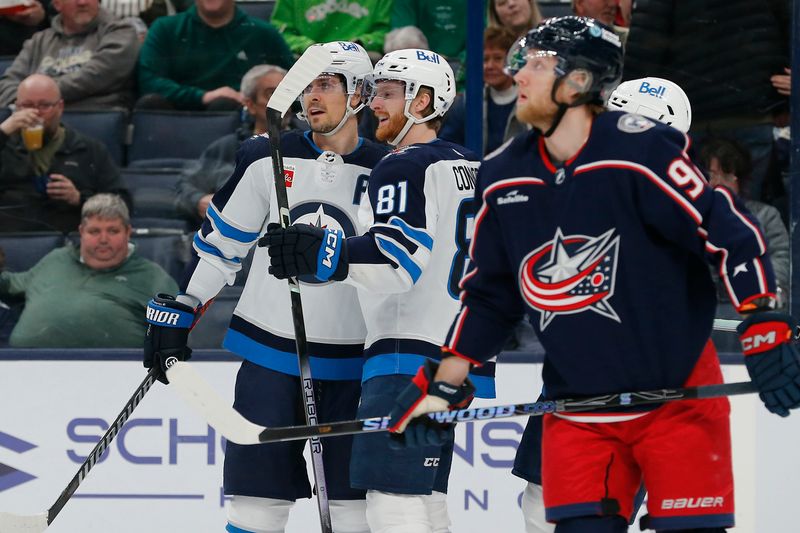 Mar 17, 2024; Columbus, Ohio, USA; Winnipeg Jets left wing Kyle Connor (81) celebrates his goal against the Columbus Blue Jackets during the first period at Nationwide Arena. Mandatory Credit: Russell LaBounty-USA TODAY Sports