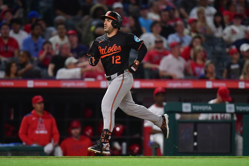 May 10, 2025; Anaheim, California, USA; Baltimore Orioles outfielder Ramon Laureano (12) runs the bases after hitting a solo home run against the Los Angeles Angels during the ninth inning at Angel Stadium. Mandatory Credit: Gary A. Vasquez-Imagn Images