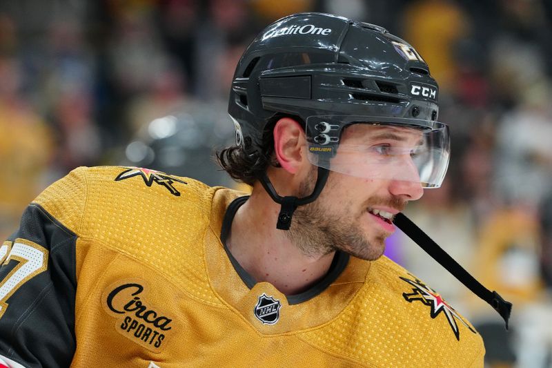 Feb 20, 2024; Las Vegas, Nevada, USA; Vegas Golden Knights defenseman Shea Theodore (27) warms up before a game against the Nashville Predators at T-Mobile Arena. Mandatory Credit: Stephen R. Sylvanie-USA TODAY Sports