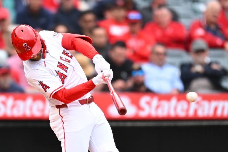 May 4, 2025; Anaheim, California, USA; Los Angeles Angels outfielder Taylor Ward (3) doubles against the Detroit Tigers during the fourth inning at Angel Stadium. Mandatory Credit: Jonathan Hui-Imagn Images