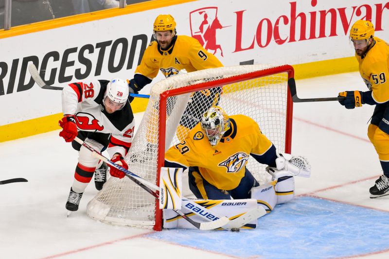 Mar 26, 2026; Nashville, Tennessee, USA; Nashville Predators goaltender Justus Annunen (29) blocks the shot of New Jersey Devils right wing Timo Meier (28) during the third period at Bridgestone Arena. Mandatory Credit: Steve Roberts-Imagn Images Mar 26, 2026; Nashville, Tennessee, USA; Nashville Predators goaltender Justus Annunen (29) blocks the shot of New Jersey Devils right wing Timo Meier (28) during the third period at Bridgestone Arena. Mandatory Credit: Steve Roberts-Imagn Images