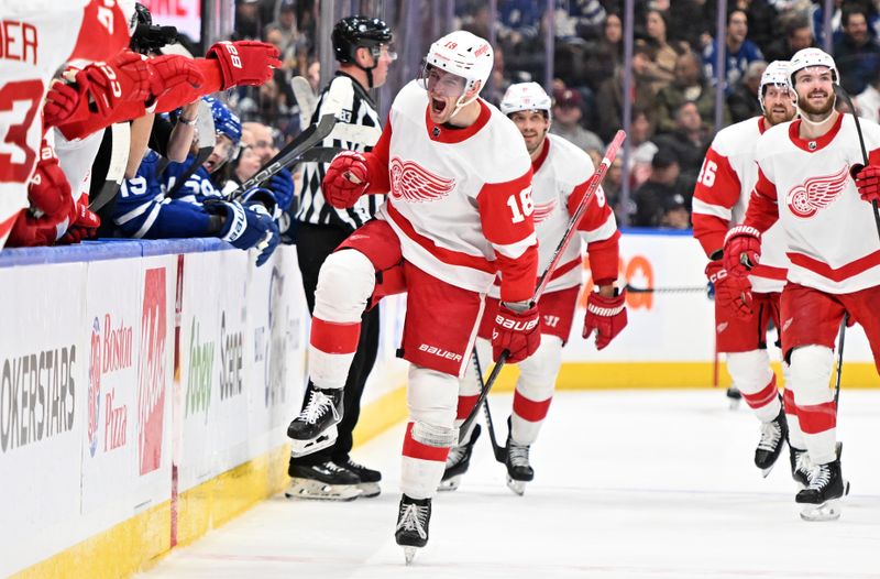 Jan 14, 2024; Toronto, Ontario, CAN;  Detroit Red Wings forward Andrew Copp (18) celebrates after scoring against the Toronto Maple Leafs in the third period at Scotiabank Arena. Mandatory Credit: Dan Hamilton-USA TODAY Sports