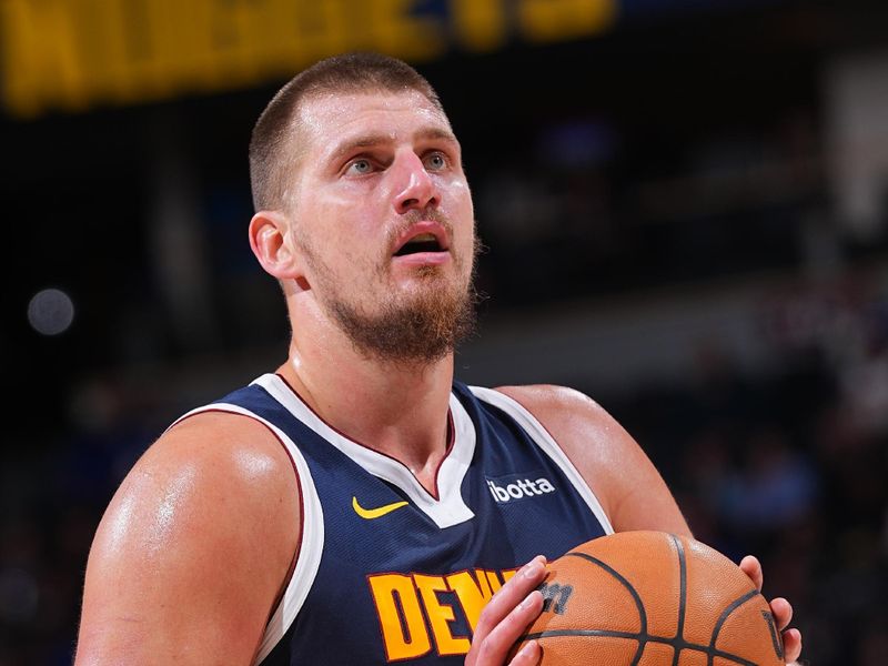 DENVER, CO - NOVEMBER 6: Nikola Jokic #15 of the Denver Nuggets shoots a free throw during the game against the Oklahoma City Thunder during a regular season game on November 6, 2024 at Ball Arena in Denver, Colorado. NOTE TO USER: User expressly acknowledges and agrees that, by downloading and/or using this Photograph, user is consenting to the terms and conditions of the Getty Images License Agreement. Mandatory Copyright Notice: Copyright 2024 NBAE (Photo by Bart Young/NBAE via Getty Images)