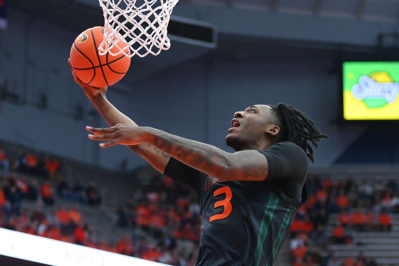 Jan 20, 2024; Syracuse, New York, USA; Miami (Fl) Hurricanes guard Christian Watson (3) drives for a shot against the Syracuse Orange during the first half at the JMA Wireless Dome. Mandatory Credit: Rich Barnes-USA TODAY Sports