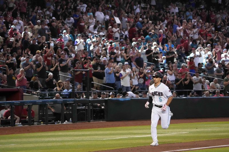 Jul 8, 2023; Phoenix, Arizona, USA; Arizona Diamondbacks center fielder Alek Thomas (5) runs the bases after hitting a solo home run against the Pittsburgh Pirates during the eighth inning at Chase Field. Mandatory Credit: Joe Camporeale-USA TODAY Sports