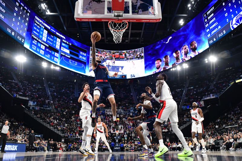 INGLEWOOD, CA - OCTOBER 30: Amir Coffey #7 of the LA Clippers drives to the basket during the game against the Portland Trail Blazers on October 30, 2024 at Intuit Dome in Los Angeles, California. NOTE TO USER: User expressly acknowledges and agrees that, by downloading and/or using this Photograph, user is consenting to the terms and conditions of the Getty Images License Agreement. Mandatory Copyright Notice: Copyright 2024 NBAE (Photo by Adam Pantozzi/NBAE via Getty Images)