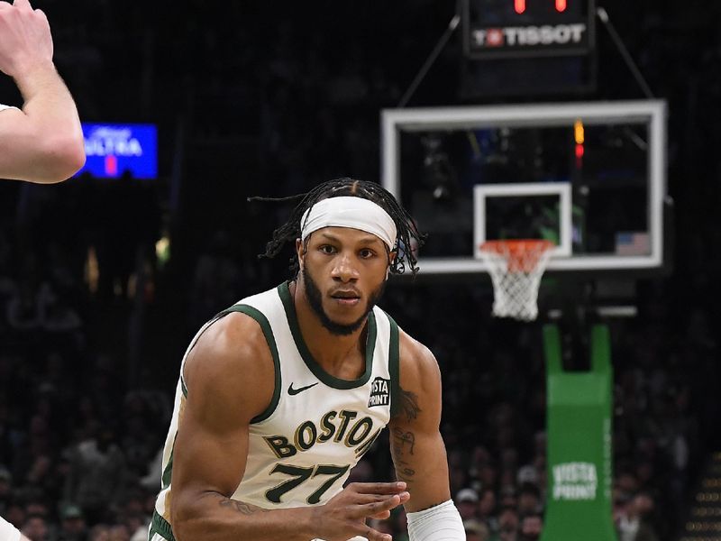 BOSTON, MA - FEBRUARY 4:  Lamar Stevens #77 of the Boston Celtics handles the ball during the game  against the Memphis Grizzlies on February 4, 2024 at the TD Garden in Boston, Massachusetts. NOTE TO USER: User expressly acknowledges and agrees that, by downloading and or using this photograph, User is consenting to the terms and conditions of the Getty Images License Agreement. Mandatory Copyright Notice: Copyright 2024 NBAE  (Photo by Brian Babineau/NBAE via Getty Images)