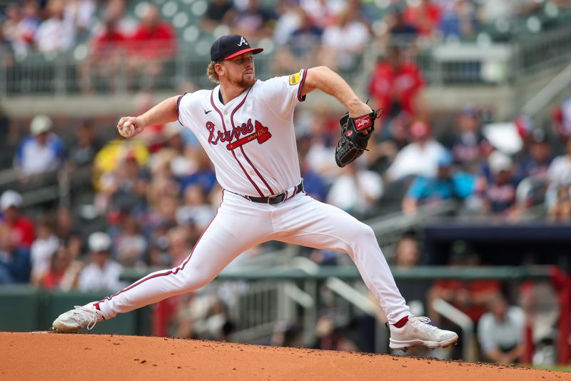 Sep 30, 2024; Atlanta, Georgia, USA; Atlanta Braves starting pitcher Spencer Schwellenbach (56) throws against the New York Mets in the second inning at Truist Park. Mandatory Credit: Brett Davis-Imagn Images
