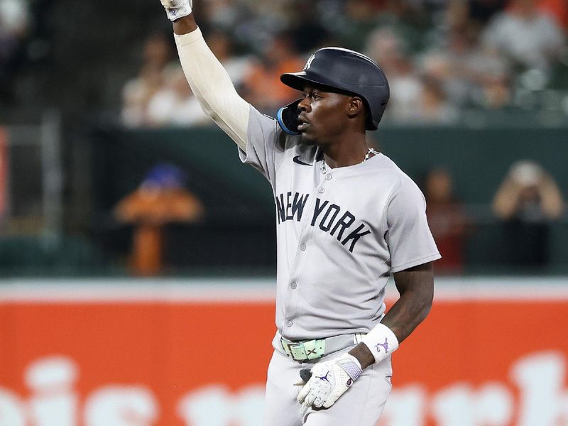 Sep 18, 2025; Baltimore, Maryland, USA; New York Yankees second baseman Jazz Chisholm Jr. (13) celebrates after hitting a double during the sixth inning against the Baltimore Orioles at Oriole Park at Camden Yards. Mandatory Credit: Daniel Kucin Jr.-Imagn Images