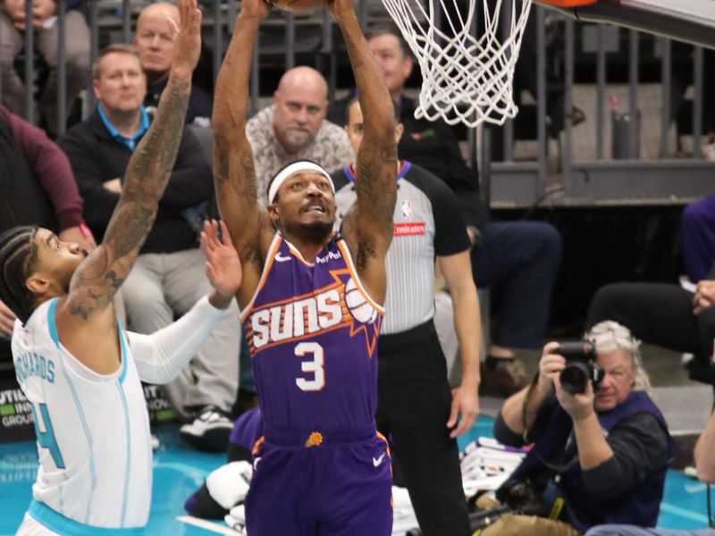 CHARLOTTE, NC - JANUARY 07:  Bradley Beal #3 of the Phoenix Suns dunks the ball during the game against the Charlotte Hornets on January 07, 2025 at Spectrum Center in Charlotte, North Carolina. NOTE TO USER: User expressly acknowledges and agrees that, by downloading and or using this photograph, User is consenting to the terms and conditions of the Getty Images License Agreement. Mandatory Copyright Notice: Copyright 2025 NBAE (Photo by Brock Williams-Smith/NBAE via Getty Images)