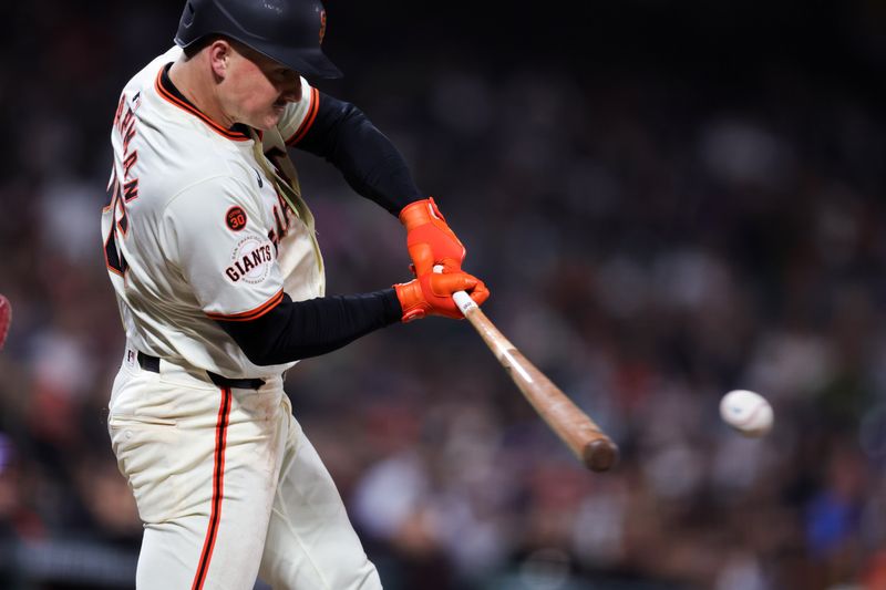 Aug 19, 2024; San Francisco, California, USA; San Francisco Giants third base Matt Chapman (26) hits a single during the eighth inning against the Chicago White Sox at Oracle Park. Mandatory Credit: Sergio Estrada-USA TODAY Sports