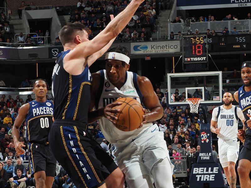INDIANAPOLIS, IN - MARCH 27: Frank Ntilikina #21 of the Dallas Mavericks drives to the basket during the game against the Indiana Pacers on March 27, 2023 at Gainbridge Fieldhouse in Indianapolis, Indiana. NOTE TO USER: User expressly acknowledges and agrees that, by downloading and or using this Photograph, user is consenting to the terms and conditions of the Getty Images License Agreement. Mandatory Copyright Notice: Copyright 2023 NBAE (Photo by Ron Hoskins/NBAE via Getty Images)