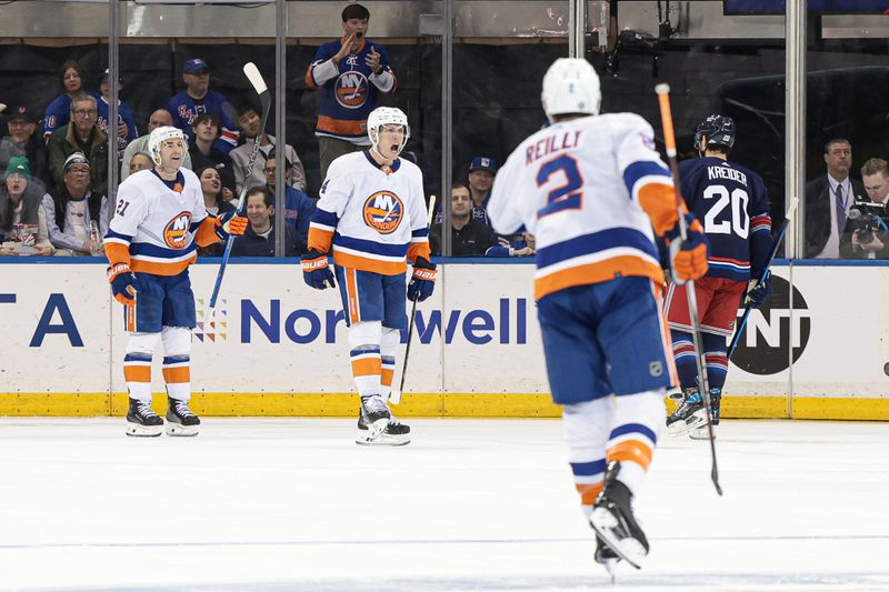 Mar 17, 2024; New York, New York, USA; New York Islanders center Bo Horvat (14) reacts after scoring a goal during the second period against the New York Rangers at Madison Square Garden. Mandatory Credit: Vincent Carchietta-USA TODAY Sports