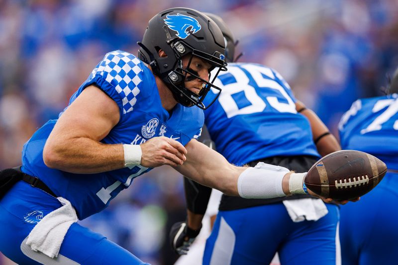 Nov 26, 2022; Lexington, Kentucky, USA; Kentucky Wildcats quarterback Will Levis (7) fakes a handoff during the first quarter against the Louisville Cardinals at Kroger Field. Mandatory Credit: Jordan Prather-USA TODAY Sports