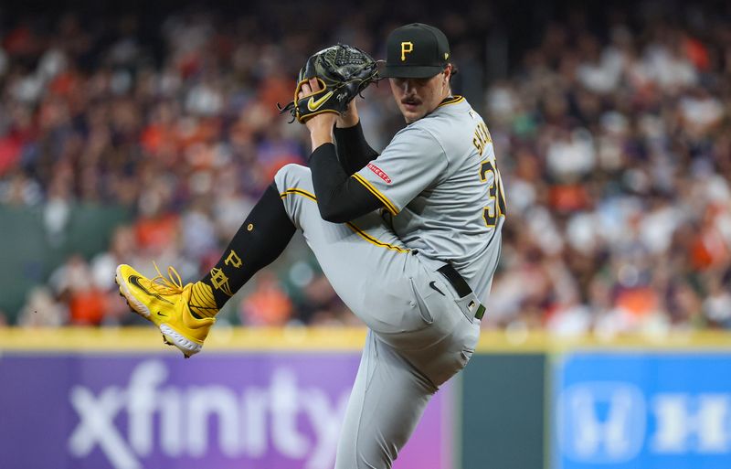 Jul 29, 2024; Houston, Texas, USA; Pittsburgh Pirates starting pitcher Paul Skenes (30) delivers a pitch during the second inning against the Houston Astros at Minute Maid Park. Mandatory Credit: Troy Taormina-USA TODAY Sports