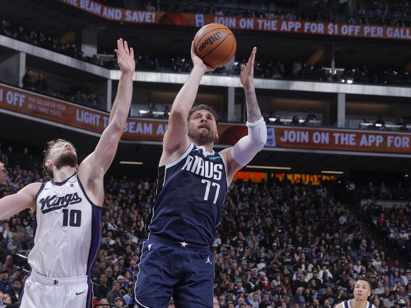 SACRAMENTO, CA - MARCH 29:  Luka Doncic #77 of the Dallas Mavericks goes to the basket during the game on March 29, 2024 at Golden 1 Center in Sacramento, California. NOTE TO USER: User expressly acknowledges and agrees that, by downloading and or using this Photograph, user is consenting to the terms and conditions of the Getty Images License Agreement. Mandatory Copyright Notice: Copyright 2024 NBAE (Photo by Rocky Widner/NBAE via Getty Images)