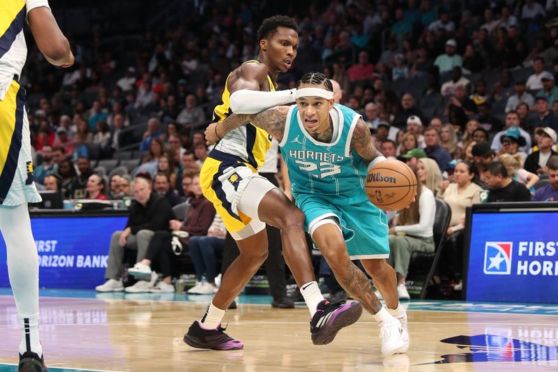 CHARLOTTE, NC - NOVEMBER 8: Tre Mann #23 of the Charlotte Hornets drives to the basket during the game against the Indiana Pacers on November 8, 2024 at Spectrum Center in Charlotte, North Carolina. NOTE TO USER: User expressly acknowledges and agrees that, by downloading and or using this photograph, User is consenting to the terms and conditions of the Getty Images License Agreement. Mandatory Copyright Notice: Copyright 2024 NBAE (Photo by Brock Williams-Smith/NBAE via Getty Images)