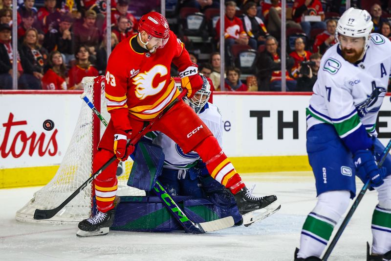 Mar 28, 2026; Calgary, Alberta, CAN; Calgary Flames right wing Adam Klapka (43) screens in front of Vancouver Canucks goaltender Nikita Tolopilo (60) during the second period at Scotiabank Saddledome. Mandatory Credit: Sergei Belski-Imagn Images Mar 28, 2026; Calgary, Alberta, CAN; Calgary Flames right wing Adam Klapka (43) screens in front of Vancouver Canucks goaltender Nikita Tolopilo (60) during the second period at Scotiabank Saddledome. Mandatory Credit: Sergei Belski-Imagn Images