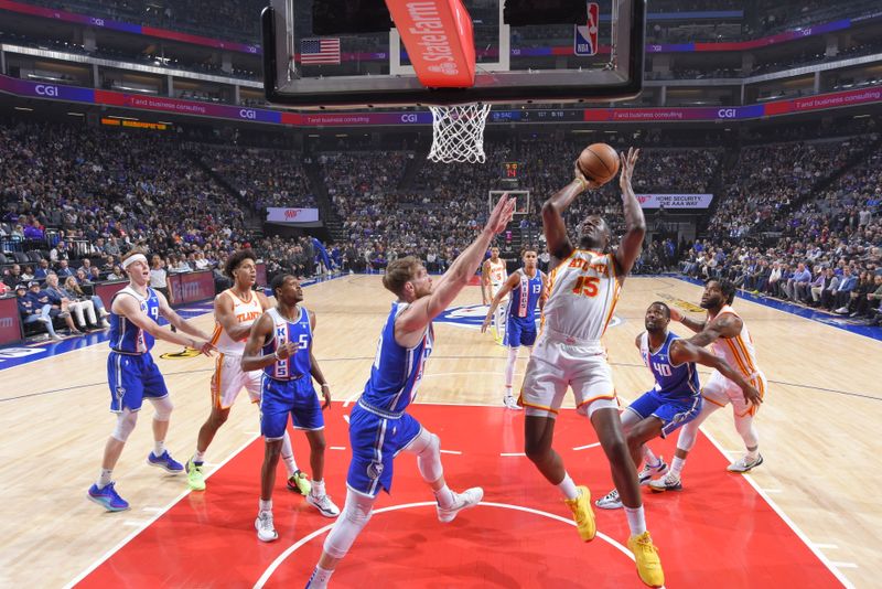 SACRAMENTO, CA - JANUARY 22: Clint Capela #15 of the Atlanta Hawks drives to the basket during the game against the Sacramento Kings on January 22, 2024 at Golden 1 Center in Sacramento, California. NOTE TO USER: User expressly acknowledges and agrees that, by downloading and or using this Photograph, user is consenting to the terms and conditions of the Getty Images License Agreement. Mandatory Copyright Notice: Copyright 2024 NBAE (Photo by Rocky Widner/NBAE via Getty Images)