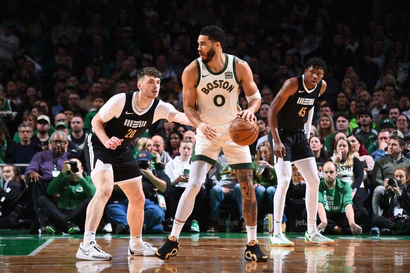 BOSTON, MA - FEBRUARY 4:  Jayson Tatum #0 of the Boston Celtics handles the ball during the game  against the Memphis Grizzlies on February 4, 2024 at the TD Garden in Boston, Massachusetts. NOTE TO USER: User expressly acknowledges and agrees that, by downloading and or using this photograph, User is consenting to the terms and conditions of the Getty Images License Agreement. Mandatory Copyright Notice: Copyright 2024 NBAE  (Photo by Brian Babineau/NBAE via Getty Images)