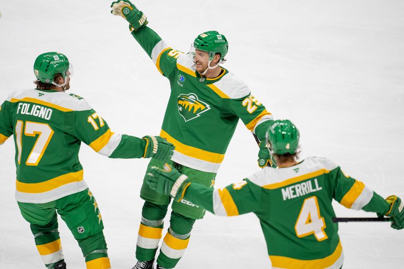 Dec 31, 2024; Saint Paul, Minnesota, USA; Minnesota Wild defenseman Jonas Brodin (25) scores against the Nashville Predators and is congratulated by teammates left wing Marcus Foligno (17) and defenseman Jon Merrill (4) in the second period at Xcel Energy Center. Mandatory Credit: Matt Blewett-Imagn Images