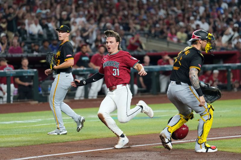 Jul 28, 2024; Phoenix, Arizona, USA; Arizona Diamondbacks outfielder Jake McCarthy (31) runs home and scores a run against the Pittsburgh Pirates during the fourth inning at Chase Field. Mandatory Credit: Joe Camporeale-USA TODAY Sports