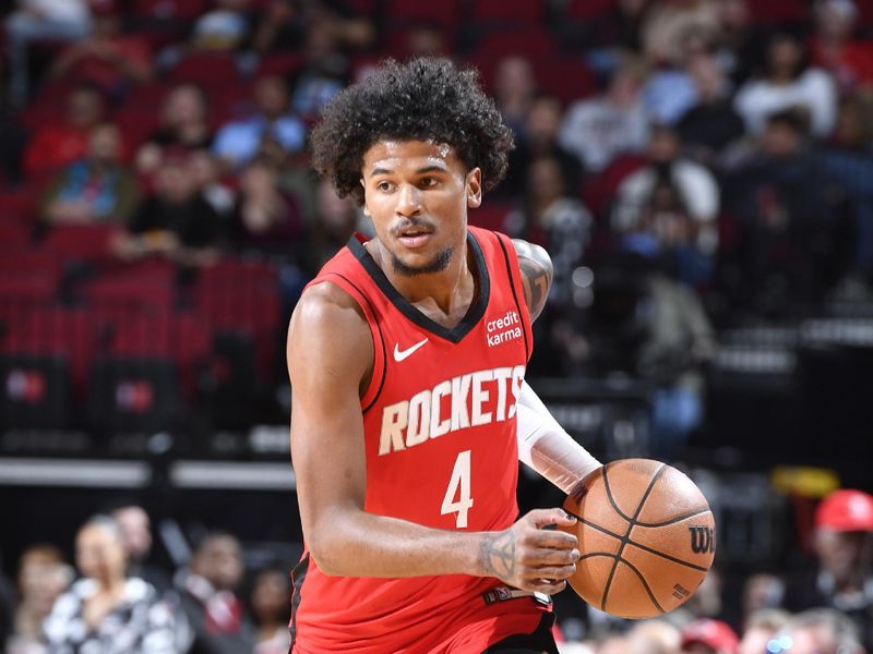 HOUSTON, TX - MARCH 25: Jalen Green #4 of the Houston Rockets handles the ball during the game against the Portland Trail Blazers on March 25, 2024 at the Toyota Center in Houston, Texas. NOTE TO USER: User expressly acknowledges and agrees that, by downloading and or using this photograph, User is consenting to the terms and conditions of the Getty Images License Agreement. Mandatory Copyright Notice: Copyright 2024 NBAE (Photo by Logan Riely/NBAE via Getty Images)