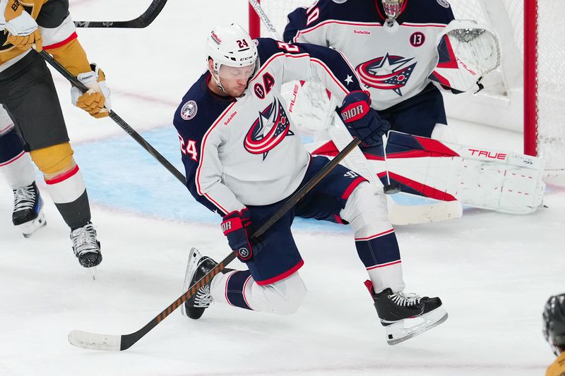 Jan 30, 2025; Las Vegas, Nevada, USA; Columbus Blue Jackets right wing Mathieu Olivier (24) blocks a shot attempt by the Vegas Golden Knights during the third period at T-Mobile Arena. Mandatory Credit: Stephen R. Sylvanie-Imagn Images