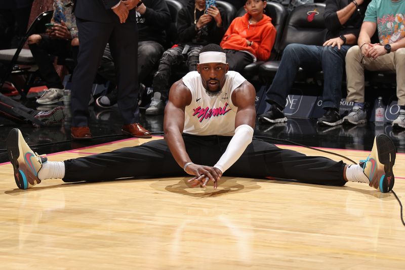 MIAMI, FL - JANUARY 17: Bam Adebayo #13 of the Miami Heat stretches before the game against the Denver Nuggets on January 17, 2025 at Kaseya Center in Miami, Florida. NOTE TO USER: User expressly acknowledges and agrees that, by downloading and or using this Photograph, user is consenting to the terms and conditions of the Getty Images License Agreement. Mandatory Copyright Notice: Copyright 2025 NBAE (Photo by Issac Baldizon/NBAE via Getty Images)