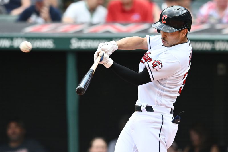 Jul 23, 2023; Cleveland, Ohio, USA; Cleveland Guardians left fielder Steven Kwan (38) hits a home run during the first inning against the Philadelphia Phillies at Progressive Field. Mandatory Credit: Ken Blaze-USA TODAY Sports