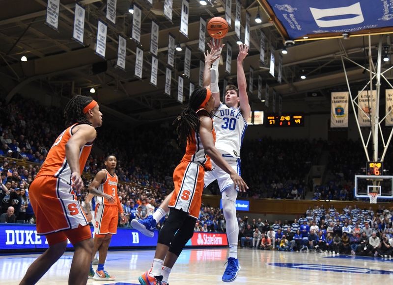 Jan 2, 2024; Durham, North Carolina, USA; Duke Blue Devils center Kyle Filipowski (30) shoot over Syracuse Orange forward Maliq Brown (1) during the second half at Cameron Indoor Stadium.  The Blue Devils won 86-66. Mandatory Credit: Rob Kinnan-USA TODAY Sports