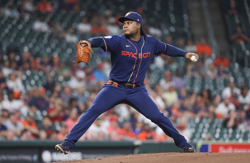 Sep 11, 2023; Houston, Texas, USA; Houston Astros starting pitcher Framber Valdez (59) delivers a pitch during the first inning against the Oakland Athletics at Minute Maid Park. Mandatory Credit: Troy Taormina-USA TODAY Sports