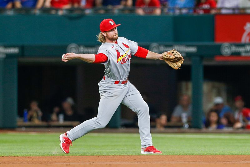 Jun 7, 2023; Arlington, Texas, USA; St. Louis Cardinals second baseman Brendan Donovan (33) fields a ground ball during the third inning against the Texas Rangers at Globe Life Field. Mandatory Credit: Andrew Dieb-USA TODAY Sports