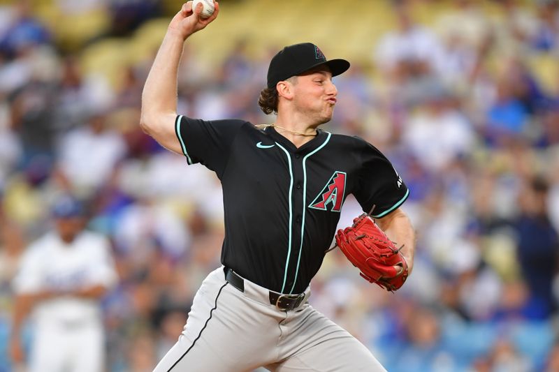 May 19, 2025; Los Angeles, California, USA; Arizona Diamondbacks pitcher Brandon Pfaadt (32) pitches in the first inning against the Los Angeles Dodgers at Dodger Stadium. Mandatory Credit: Gary A. Vasquez-Imagn Images